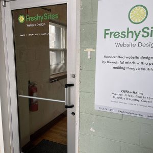 FreshySites lobby with poster in Chicago, IL office